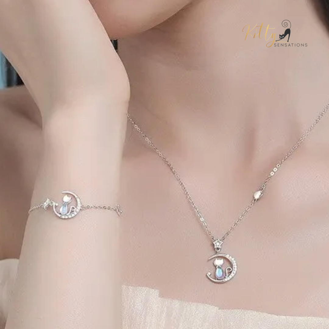 Blue Crystal Moon Kitty Bracelet in Solid 925 Sterling Silver (Adjustable Length) ($80.77): https://www.kittysensations.com/products/blue-crystal-moon-kitty-bracelet-in-solid-925-sterling-silver-adjustable-length
