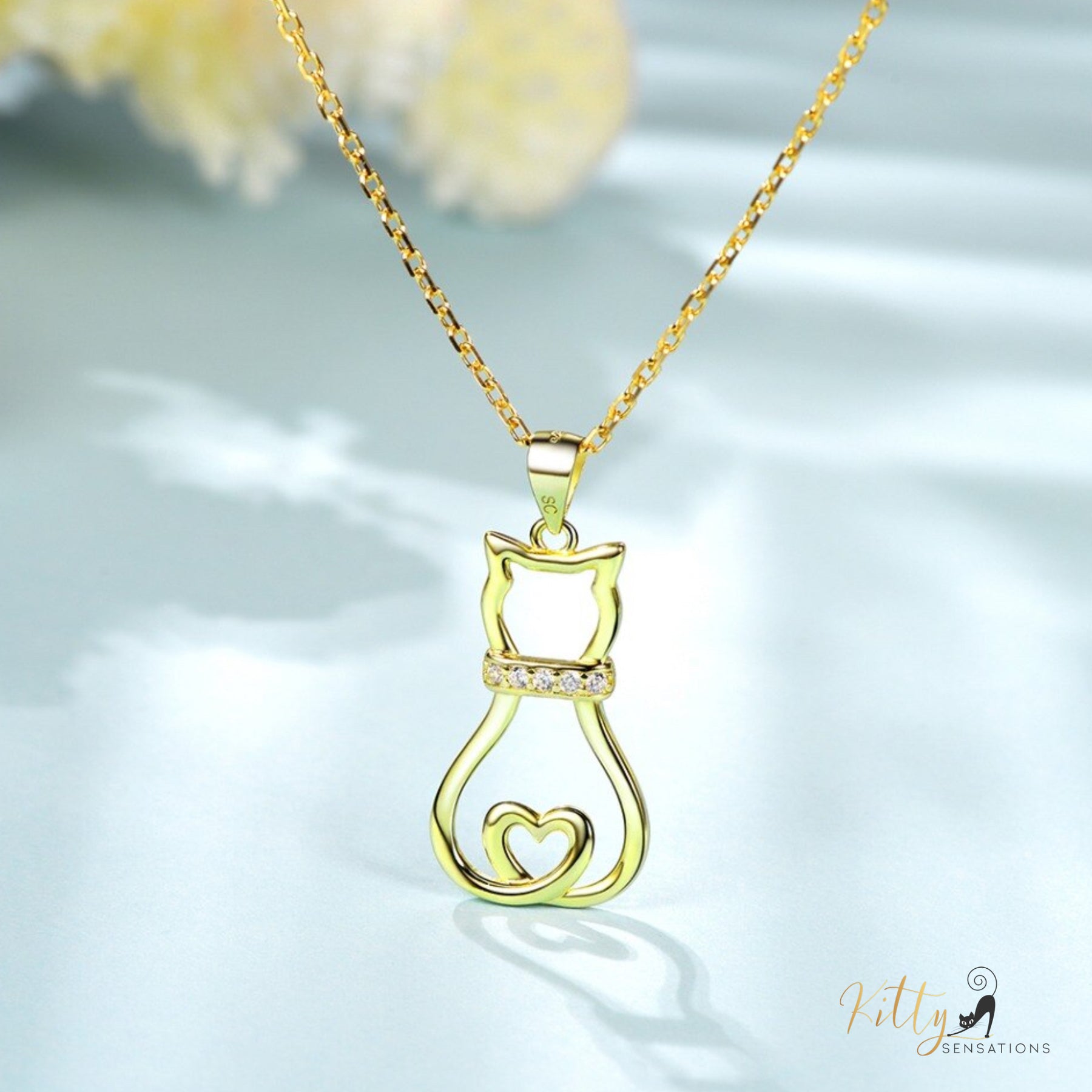 www.KittySensations.com: Doodle Cat with CZ Collar Necklace in Solid 925 Sterling Silver (18K Gold Plated) ($88.94): https://www.kittysensations.com/products/doodle-cat-with-cz-collar-necklace-in-solid-925-sterling-silver