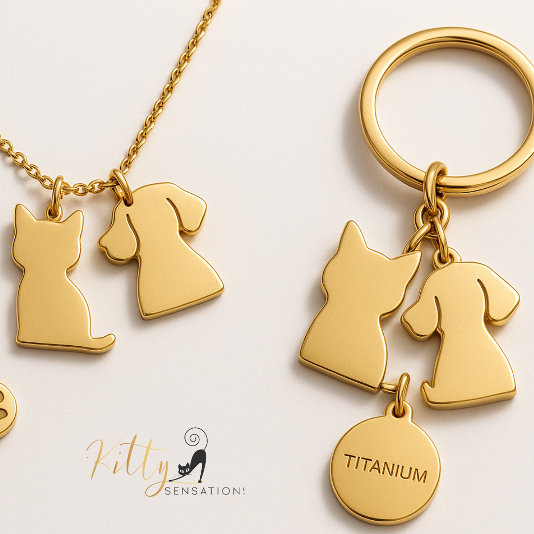 Gold cat and dog pendant keychain and necklace on a light background with 'Fitty Sensation!' branding.
