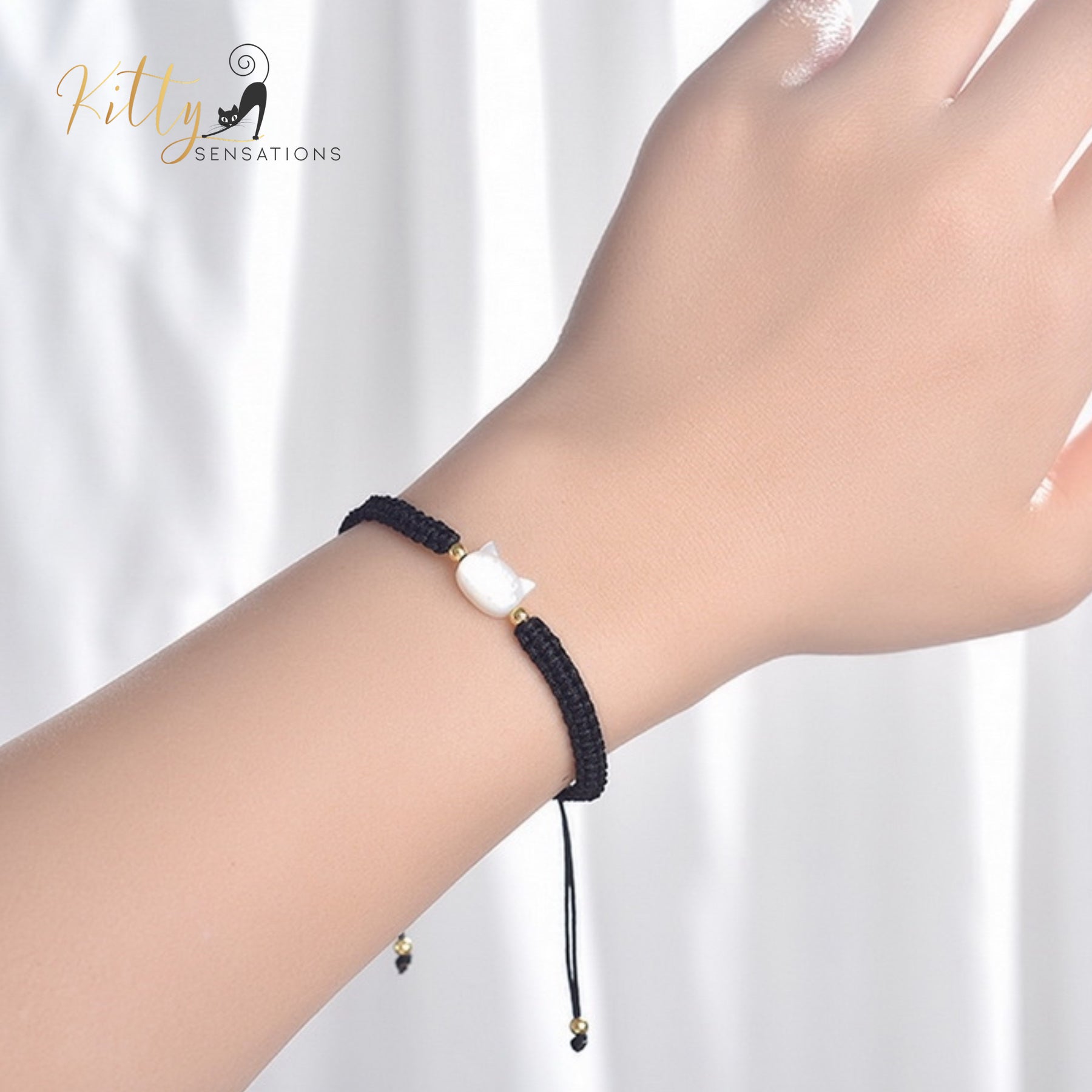 www.KittySensations.com: Natural Mother-of-Pearl and Braided Cord Cat Bracelet (Adjustable Size) ($20.40): https://www.kittysensations.com/products/mother-of-pearl-and-braided-cord-cat-bracelet-adjustable-size