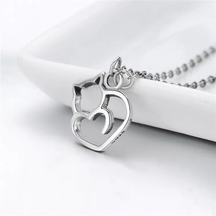 www.KittySensations.com: Cat Heart Necklace in Solid 925 Sterling Silver - Platinum or Gold Plated (Available in 3 Finishes) ($46.55): https://www.kittysensations.com/products/sterling-silver-cat-heart-necklace-platinum-plated