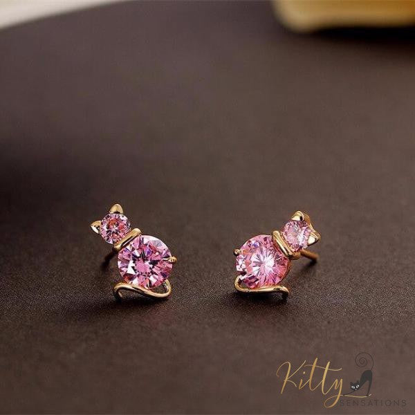 pink cat stud earrings with amethysts black background kittysensations