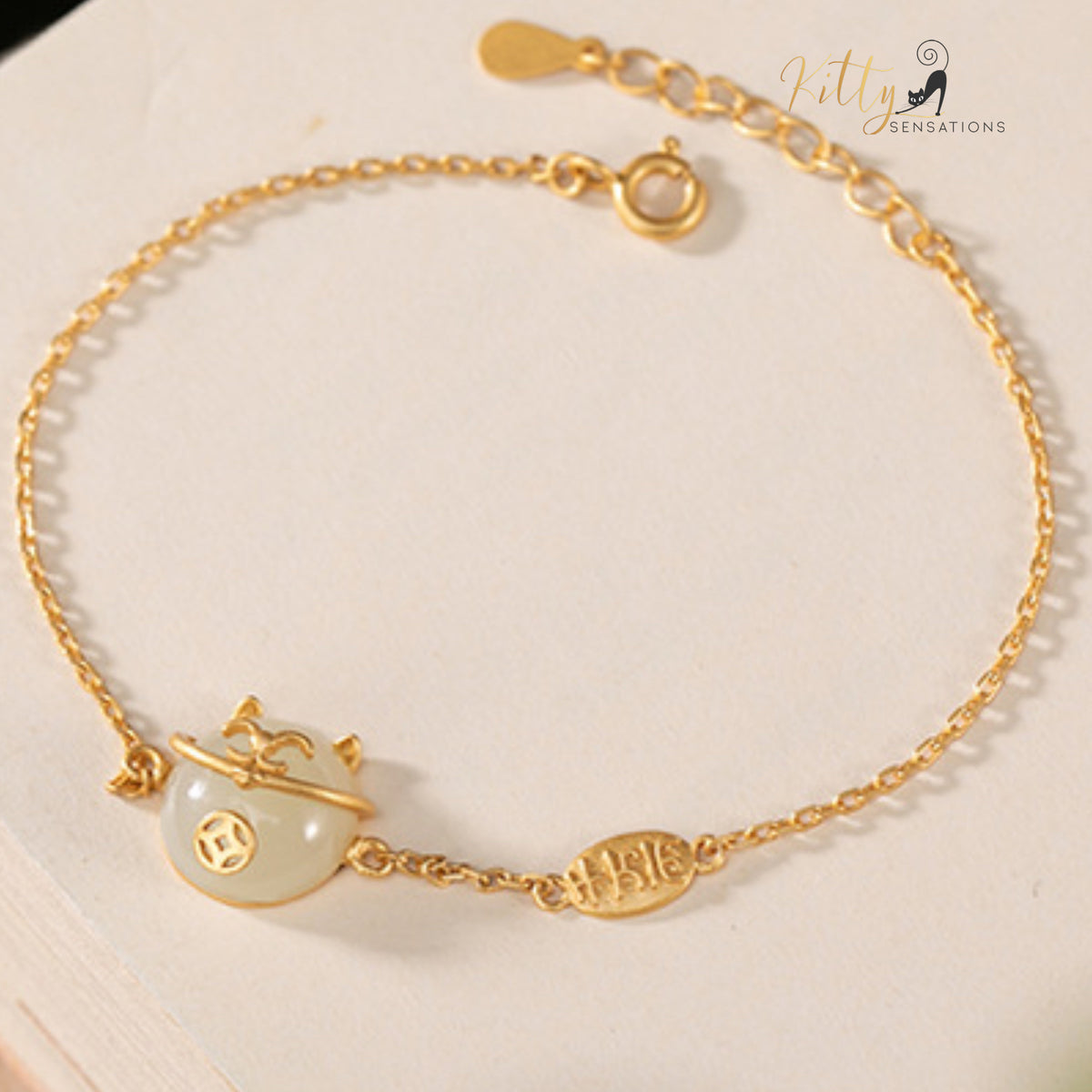 www.KittySensations.com Natural Jade Cat Bracelet in Solid 925 Sterling Silver (Gold Plated) ($115.42): https://www.kittysensations.com/products/natural-jade-bracelet-in-solid-925-sterling-silver-gold-plated?_pos=1&_psq=jade+bracelet&_ss=e&_v=1.0