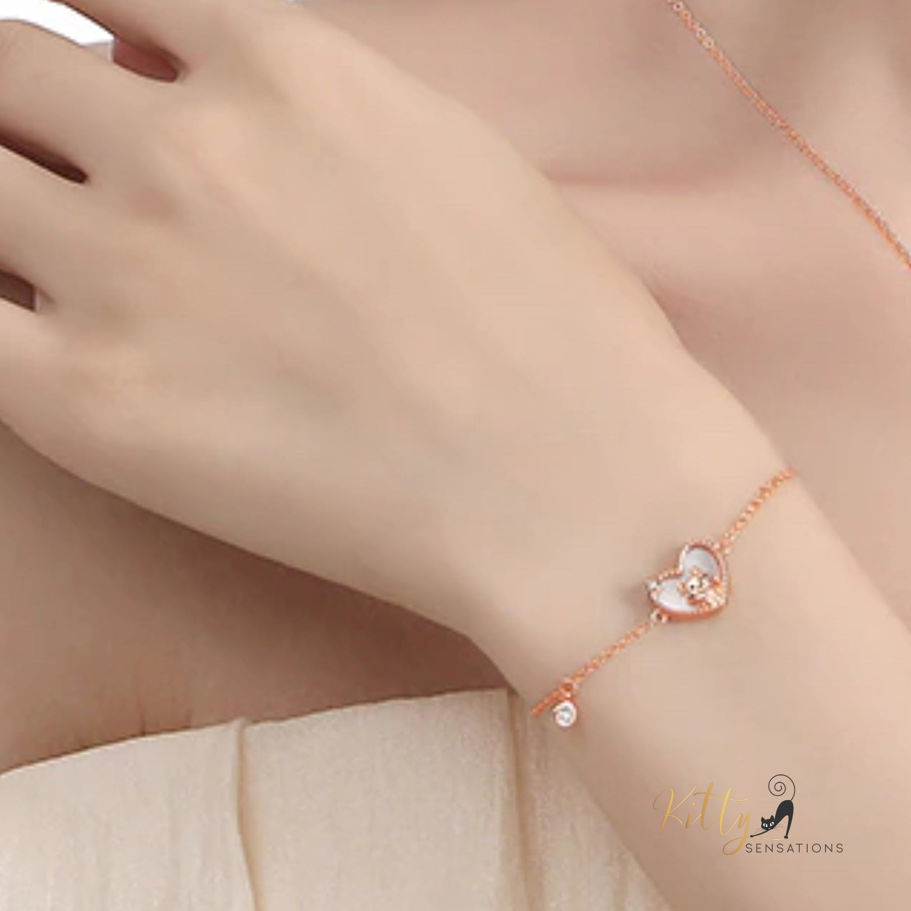www.KittySensations.com: Raised Kitty in Heart Bracelet in Solid 925 Sterling Silver - Rose Gold Plated ($53.57): https://www.kittysensations.com/products/raised-kitty-in-heart-bracelet-in-solid-925-sterling-silver