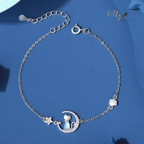 Blue Crystal Moon Kitty Bracelet in Solid 925 Sterling Silver (Adjustable Length) ($80.77): https://www.kittysensations.com/products/blue-crystal-moon-kitty-bracelet-in-solid-925-sterling-silver-adjustable-length