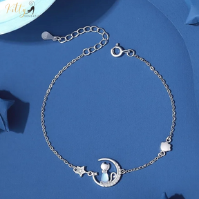 Blue Crystal Moon Kitty Bracelet in Solid 925 Sterling Silver (Adjustable Length) ($80.77): https://www.kittysensations.com/products/blue-crystal-moon-kitty-bracelet-in-solid-925-sterling-silver-adjustable-length