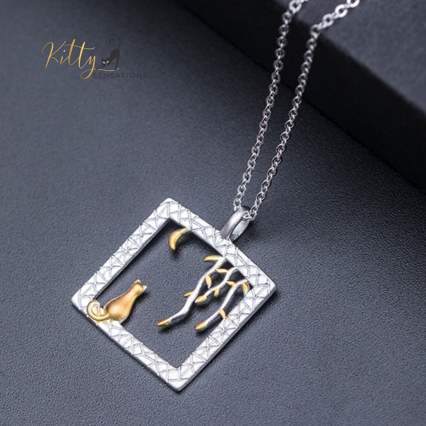www.KittySensations.com: Golden Moon Kitty in Silver Square Necklace in Solid 925 Sterling Silver (18K Gold Plated) ($80.90): https://www.kittysensations.com/products/golden-moon-kitty-in-silver-square-necklace-in-solid-925-sterling-silver-18k-gold-plated