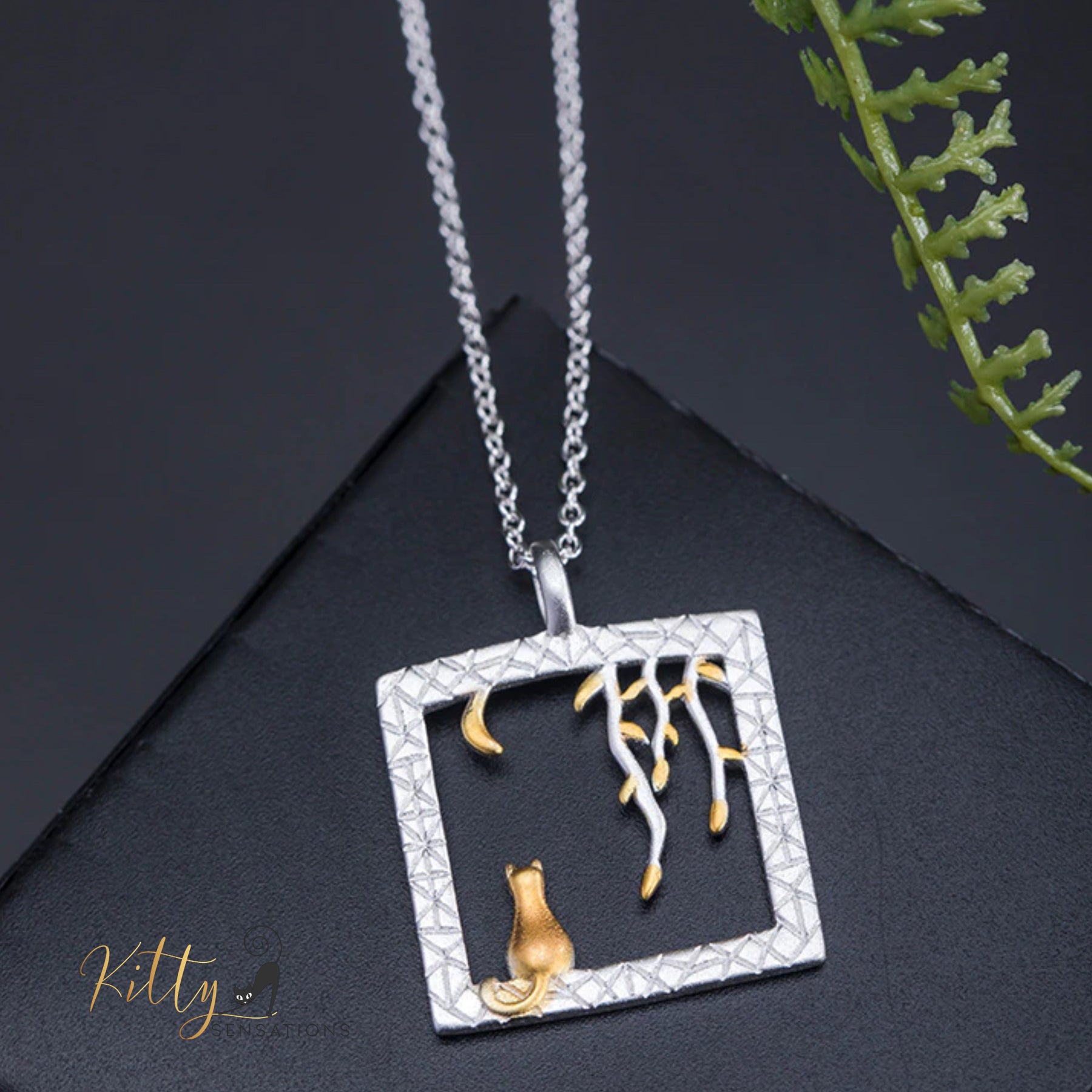 www.KittySensations.com: Golden Moon Kitty in Silver Square Necklace in Solid 925 Sterling Silver (18K Gold Plated) ($80.90): https://www.kittysensations.com/products/golden-moon-kitty-in-silver-square-necklace-in-solid-925-sterling-silver-18k-gold-plated