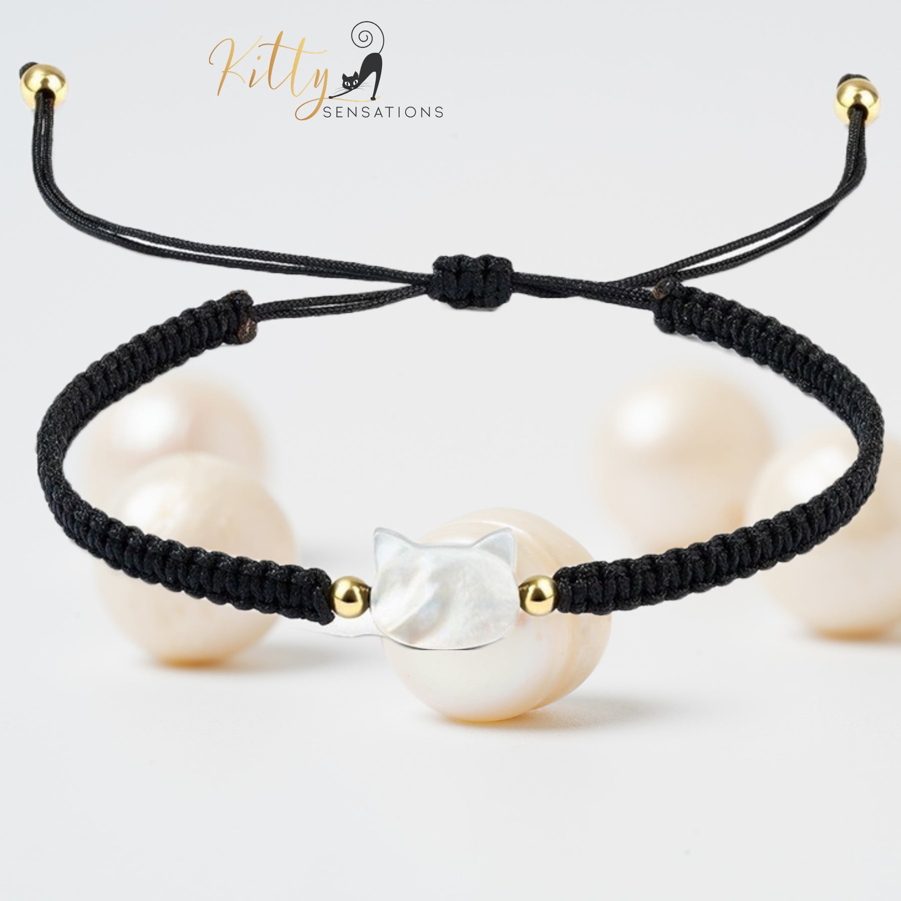 www.KittySensations.com: Natural Mother-of-Pearl and Braided Cord Cat Bracelet (Adjustable Size) ($20.40): https://www.kittysensations.com/products/mother-of-pearl-and-braided-cord-cat-bracelet-adjustable-size