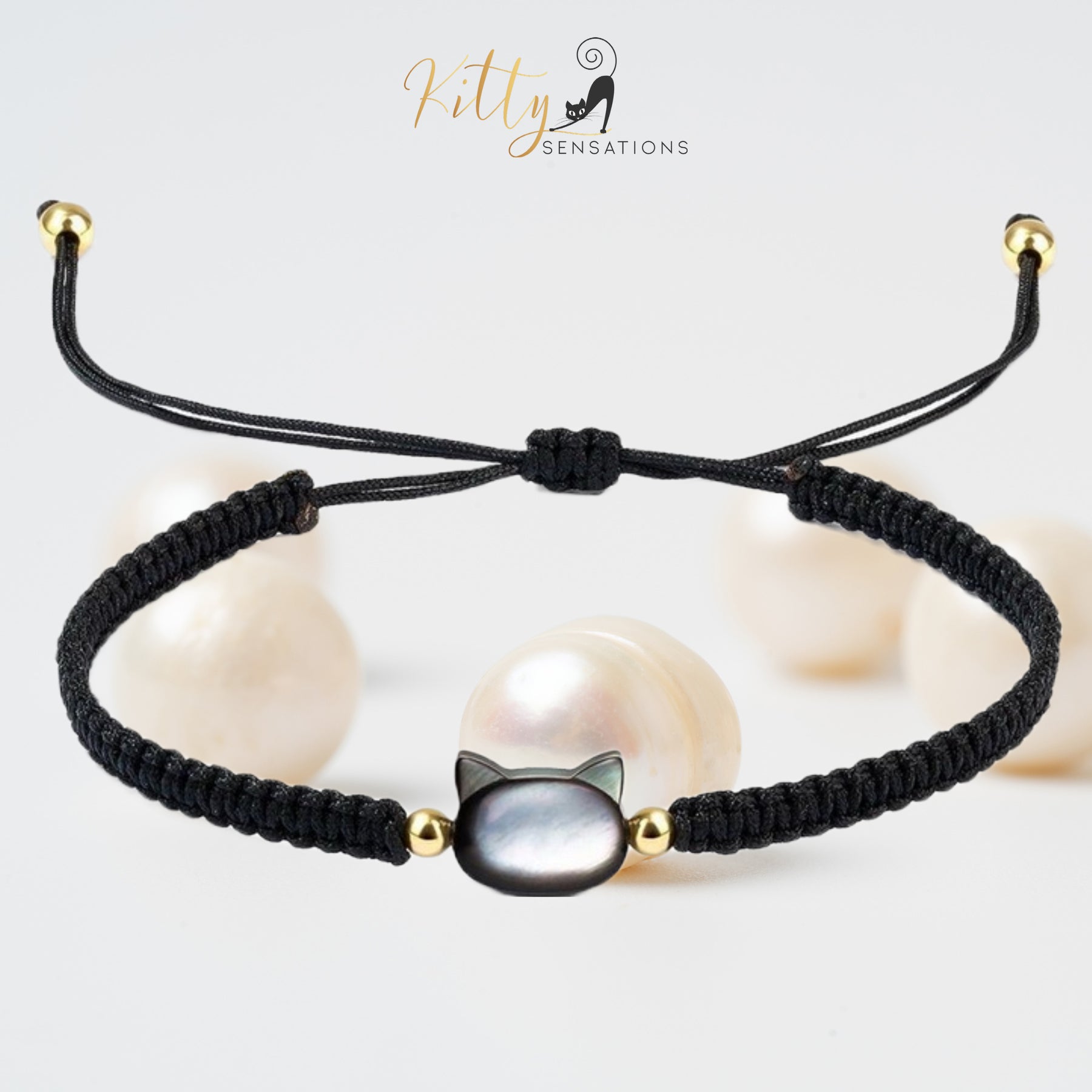 www.KittySensations.com: Natural Mother-of-Pearl and Braided Cord Cat Bracelet (Adjustable Size) ($20.40): https://www.kittysensations.com/products/mother-of-pearl-and-braided-cord-cat-bracelet-adjustable-size