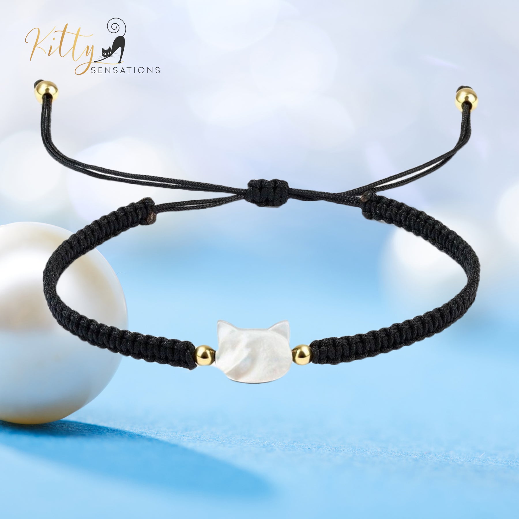 www.KittySensations.com: Natural Mother-of-Pearl and Braided Cord Cat Bracelet (Adjustable Size) ($20.40): https://www.kittysensations.com/products/mother-of-pearl-and-braided-cord-cat-bracelet-adjustable-size