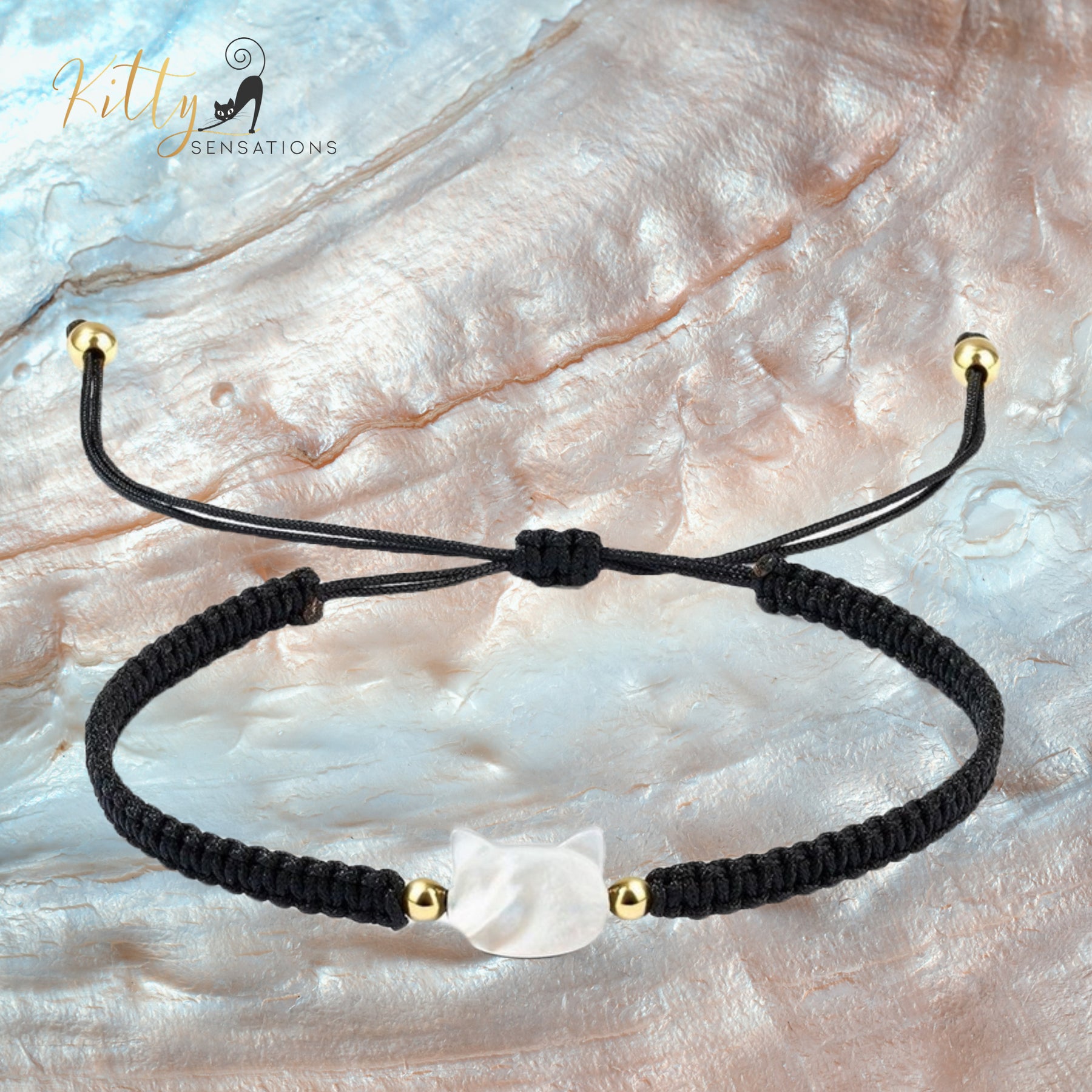 www.KittySensations.com: Natural Mother-of-Pearl and Braided Cord Cat Bracelet (Adjustable Size) ($20.40): https://www.kittysensations.com/products/mother-of-pearl-and-braided-cord-cat-bracelet-adjustable-size