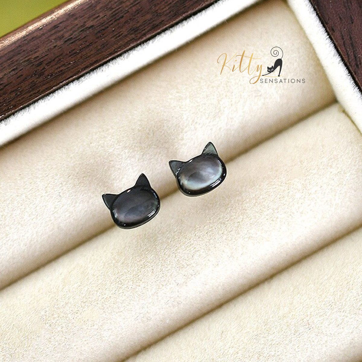 www.KittySensations.com: Mother-of-Pearl Cat Stud Earrings in Solid 925 Sterling Silver ($32.38): https://www.kittysensations.com/products/mother-of-pearl-cat-stud-earrings-in-solid-925-sterling-silver