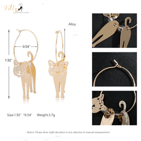 Moving Cat Hoop Earrings - Bronze-Gold Color: These absolutely gorgeous and dynamic earrings are a must have for a cat loving lady. The subtle bronze-gold colored earrings show pierced profiles of a cute kitty in three different bronze-gold colored foils that move as you move, depicting the graceful movements of your lovely cat.  https://www.kittysensations.com/products/moving-cat-hoop-earrings