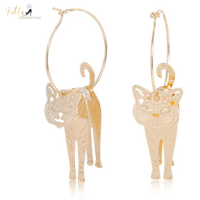 Moving Cat Hoop Earrings - Bronze-Gold Color: These absolutely gorgeous and dynamic earrings are a must have for a cat loving lady. The subtle bronze-gold colored earrings show pierced profiles of a cute kitty in three different bronze-gold colored foils that move as you move, depicting the graceful movements of your lovely cat.  https://www.kittysensations.com/products/moving-cat-hoop-earrings