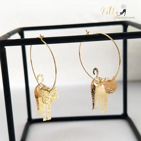 Moving Cat Hoop Earrings - Bronze-Gold Color: These absolutely gorgeous and dynamic earrings are a must have for a cat loving lady. The subtle bronze-gold colored earrings show pierced profiles of a cute kitty in three different bronze-gold colored foils that move as you move, depicting the graceful movements of your lovely cat.  https://www.kittysensations.com/products/moving-cat-hoop-earrings