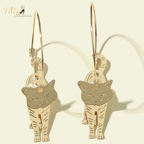 Moving Cat Hoop Earrings - Bronze-Gold Color: These absolutely gorgeous and dynamic earrings are a must have for a cat loving lady. The subtle bronze-gold colored earrings show pierced profiles of a cute kitty in three different bronze-gold colored foils that move as you move, depicting the graceful movements of your lovely cat.  https://www.kittysensations.com/products/moving-cat-hoop-earrings