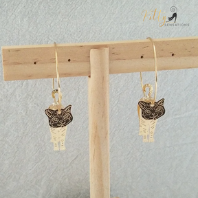 Moving Cat Hoop Earrings - Bronze-Gold Color: These absolutely gorgeous and dynamic earrings are a must have for a cat loving lady. The subtle bronze-gold colored earrings show pierced profiles of a cute kitty in three different bronze-gold colored foils that move as you move, depicting the graceful movements of your lovely cat.  https://www.kittysensations.com/products/moving-cat-hoop-earrings