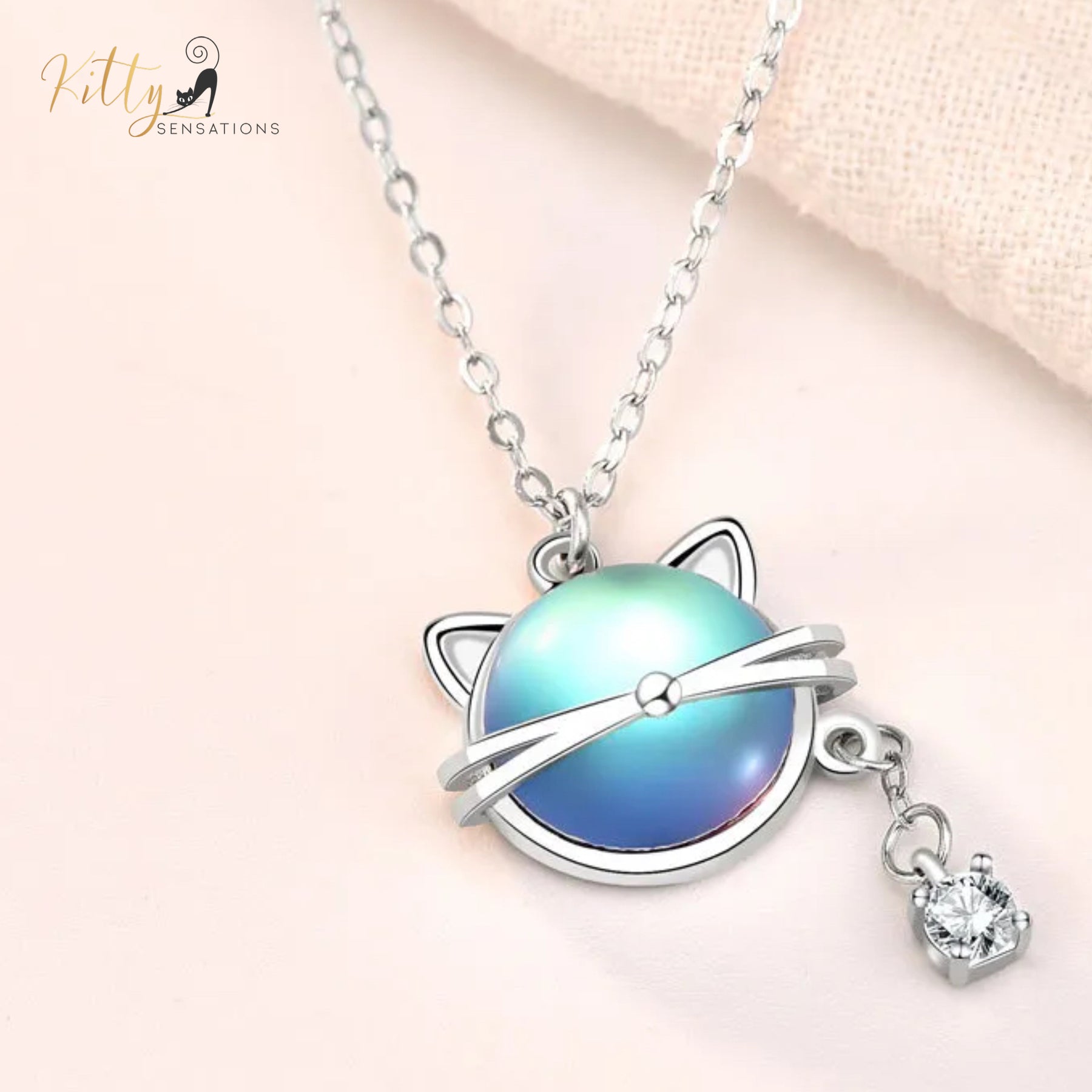 www.KittySensations.com: Natural Round Moonstone Kitty-Face Necklace with Hanging CZ, in Solid 925 Sterling Silver (Rhodium Plated): https://www.kittysensations.com/products/natural-round-moonstone-kitty-face-necklace-with-hanging-cz-in-solid-925-sterling-silver-rhodium-plated