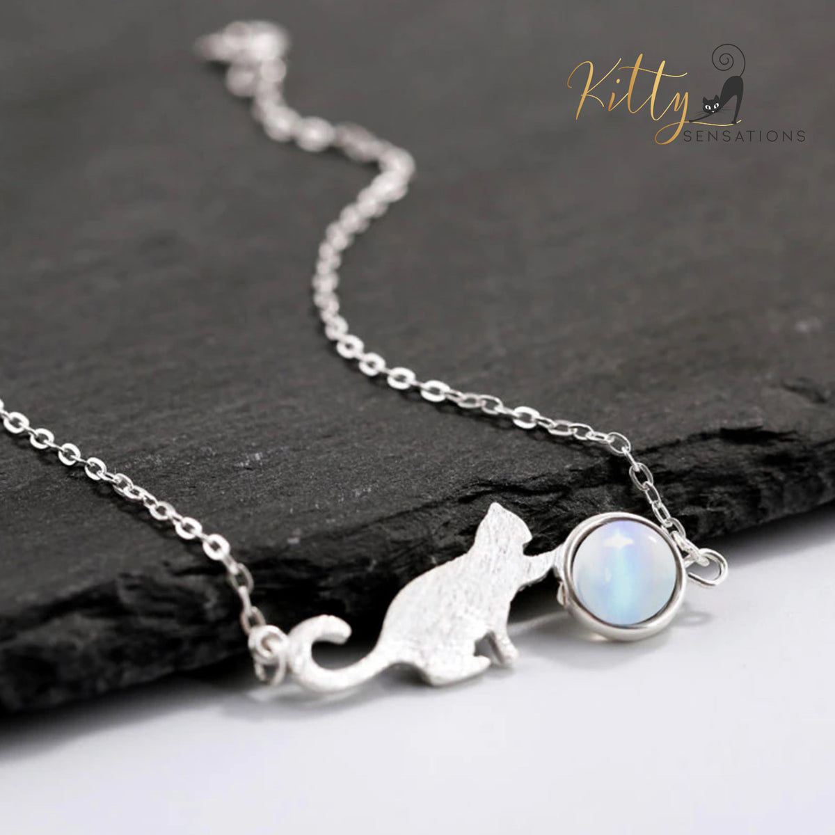 www.KittySensations.com: Playful Cat Round Opal Bracelet in Solid 925 Sterling Silver ($28.00): https://www.kittysensations.com/products/playful-cat-round-opal-bracelet-in-solid-925-sterling-silver