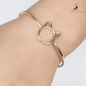 Purrfection Cat Cuff Bracelet ($19.95): https://www.kittysensations.com/products/purrfection-cat-cuff-bracelet?_pos=3&_psq=purrfec&_ss=e&_v=1.0&variant=31163404484674