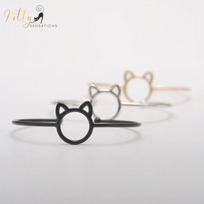 Purrfection Cat Cuff Bracelet ($19.95): https://www.kittysensations.com/products/purrfection-cat-cuff-bracelet?_pos=3&_psq=purrfec&_ss=e&_v=1.0&variant=31163404484674