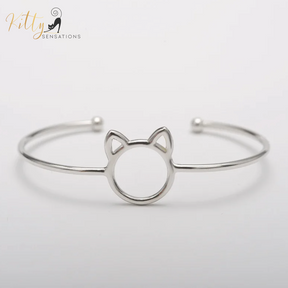 Purrfection Cat Cuff Bracelet ($19.95): https://www.kittysensations.com/products/purrfection-cat-cuff-bracelet?_pos=3&_psq=purrfec&_ss=e&_v=1.0&variant=31163404484674