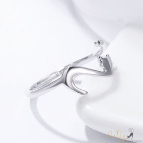 elegant cat ring in sterling silver on white background 12531362