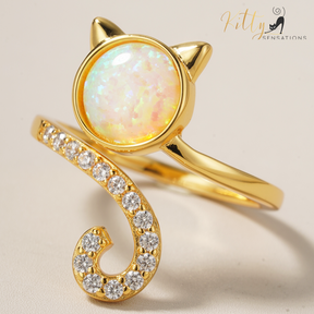 Solid 925 Sterling Silver, gold-plated cat-shaped ring with large opal center stone for kitty face with cute ears and AAA quality cubic zirconia adorning the kitty tail of this adjustable size ring. 