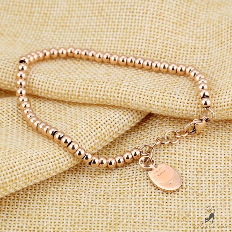 cat charm bracelet plated in rose gold kittysensations2 4396504-rose-gold-color