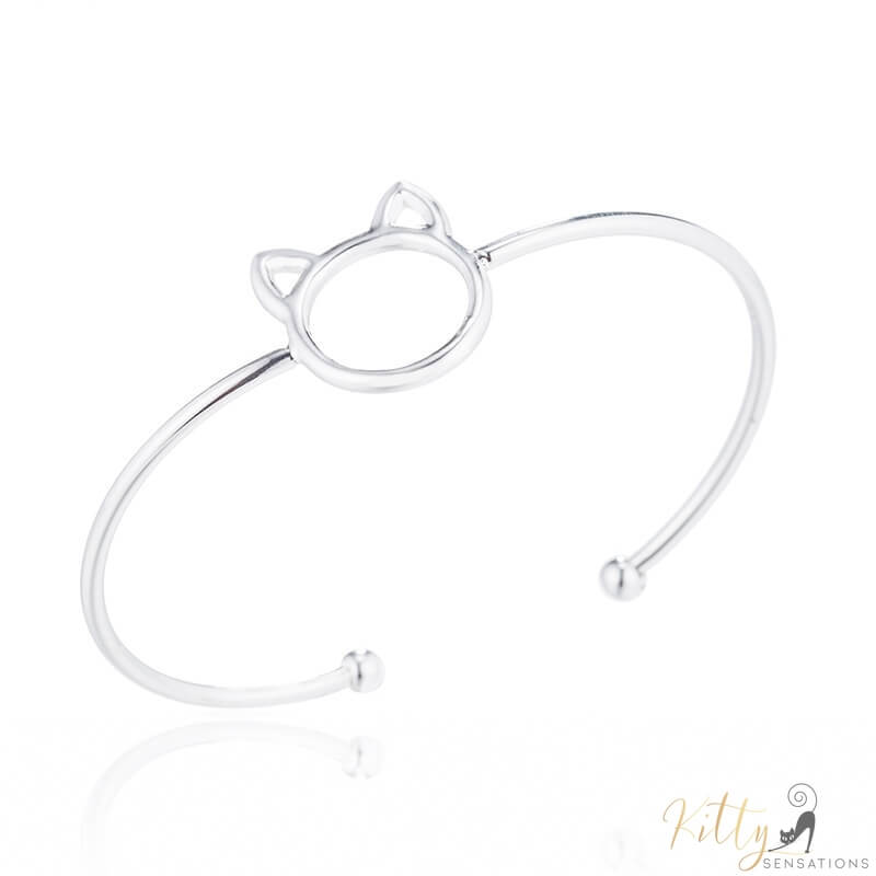 beautiful silver cat cuff bracelet on white background