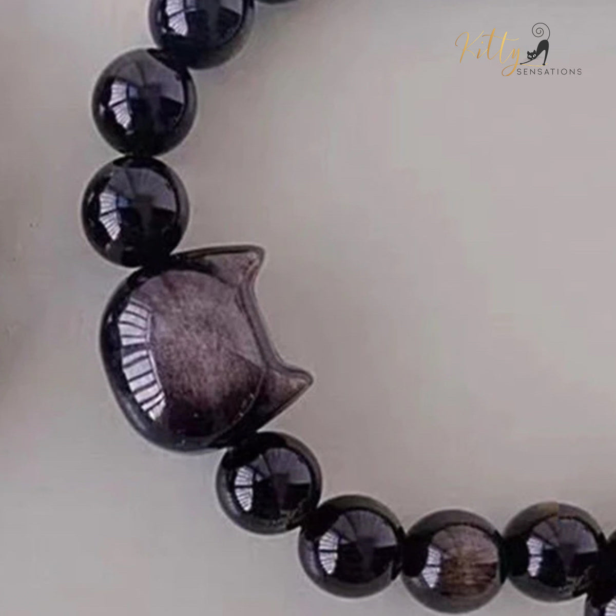http://KittySensations.com Natural Obsidian Cat Bracelet - Adjustable Size ($51.99): https://kittysensations.com/products/natural-obsidian-cat-bracelet-adjustable-size
