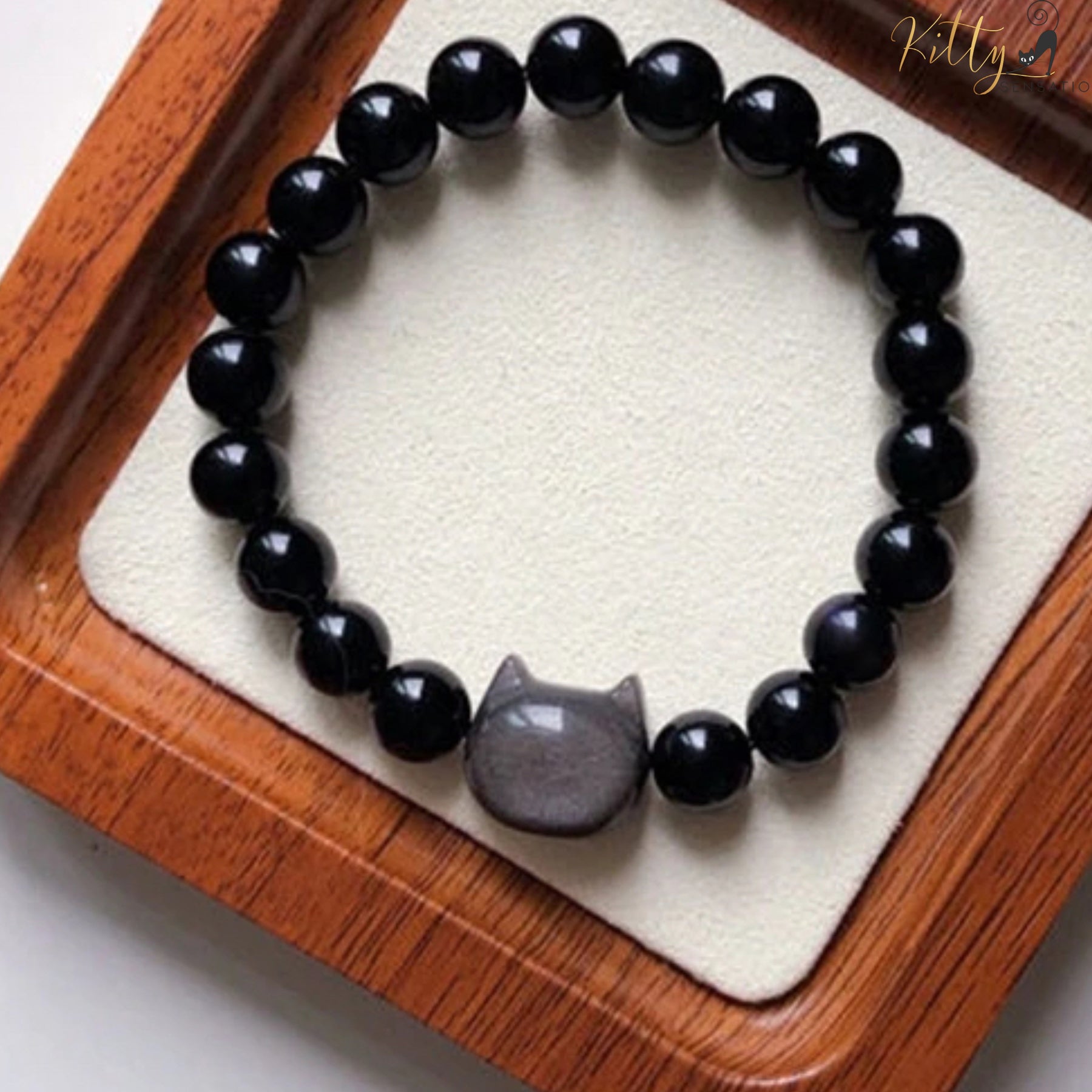 http://KittySensations.com Natural Obsidian Cat Bracelet - Adjustable Size ($51.99): https://kittysensations.com/products/natural-obsidian-cat-bracelet-adjustable-size