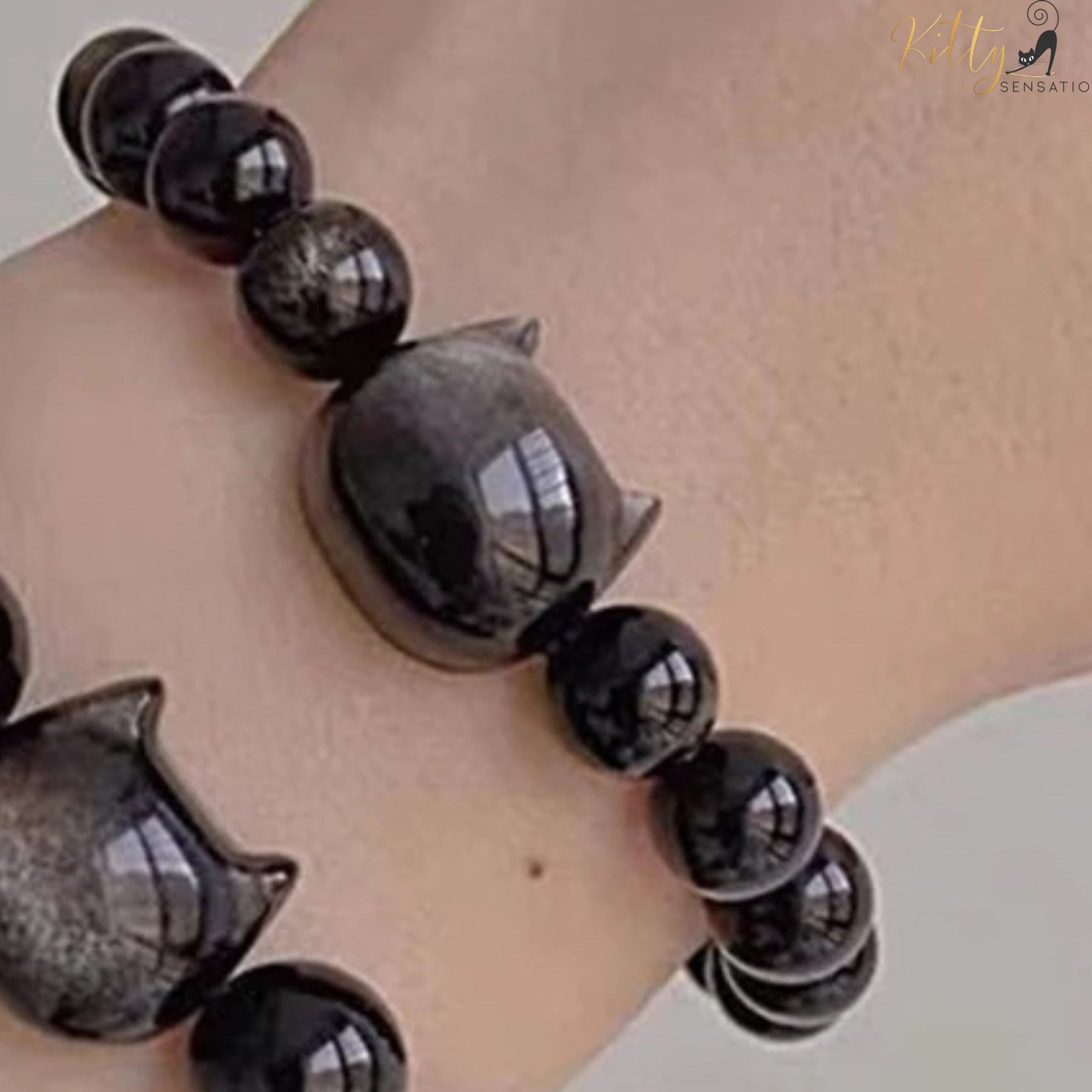 http://KittySensations.com Natural Obsidian Cat Bracelet - Adjustable Size ($51.99): https://kittysensations.com/products/natural-obsidian-cat-bracelet-adjustable-size