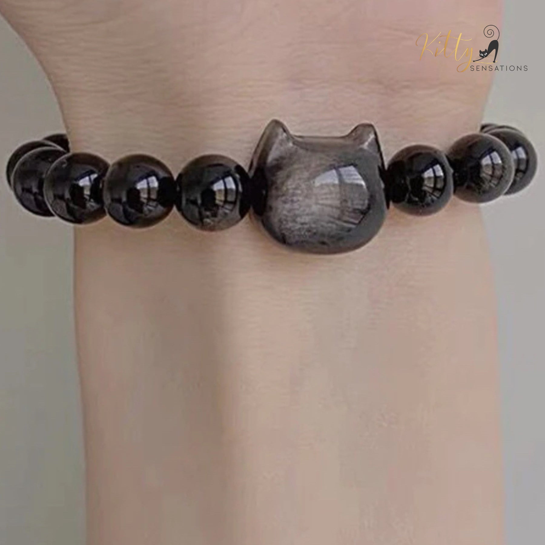 http://KittySensations.com Natural Obsidian Cat Bracelet - Adjustable Size ($51.99): https://kittysensations.com/products/natural-obsidian-cat-bracelet-adjustable-size