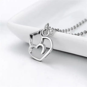 www.KittySensations.com: Cat Heart Necklace in Solid 925 Sterling Silver - Platinum or Gold Plated (Available in 3 Finishes) ($46.55): https://www.kittysensations.com/products/sterling-silver-cat-heart-necklace-platinum-plated