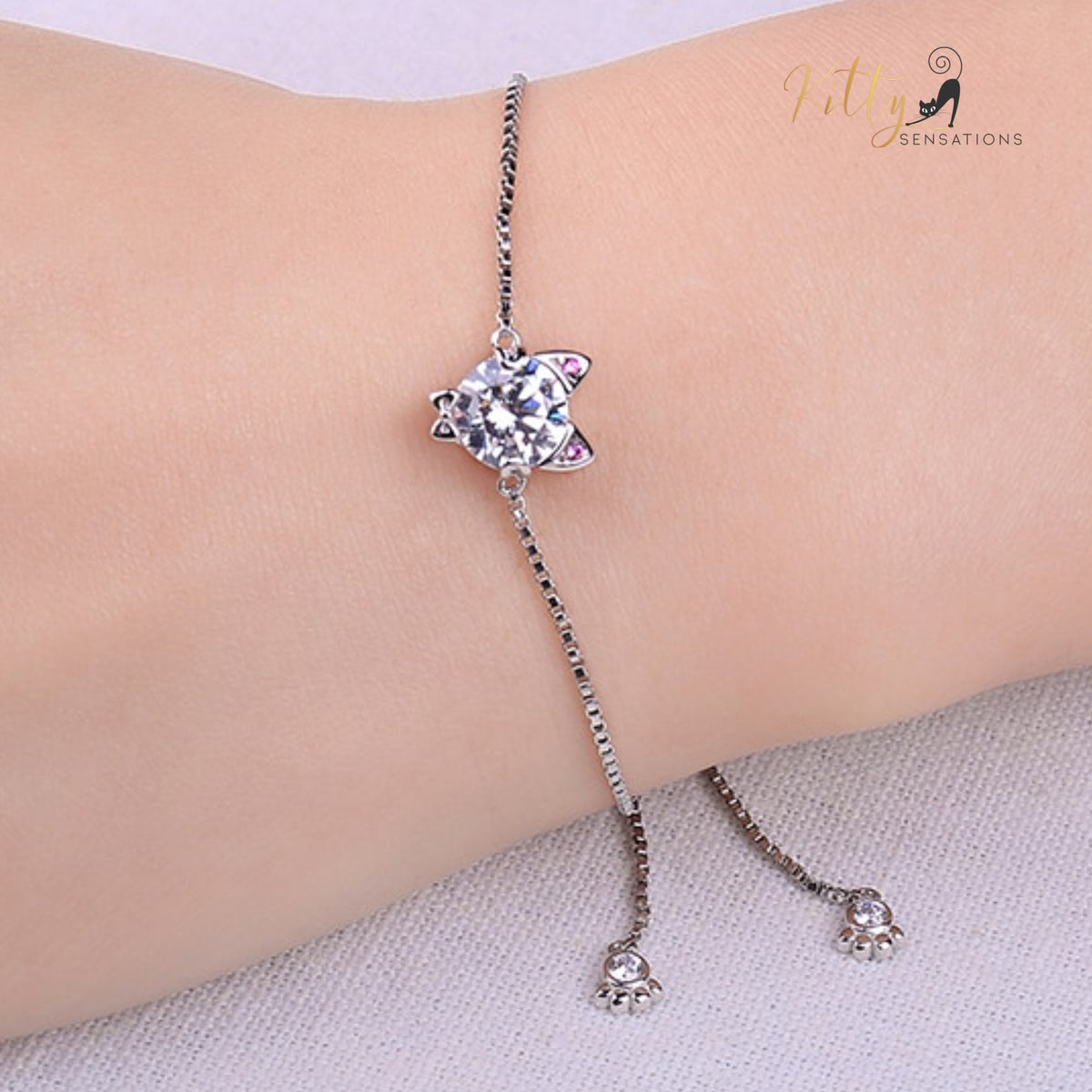 www.KittySensations.com: Sparkling CZ Kitty Bracelet (Fine Jewelry) - Solid Sterling Silver ($82.34): https://www.kittysensations.com/products/classy-sparkling-cz-kitty-bracelet-fine-jewelry-in-solid-sterling-silver