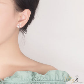 cat moon earrings in sterling silver worn on woman ear 21939147-light-yellow-gold-color
