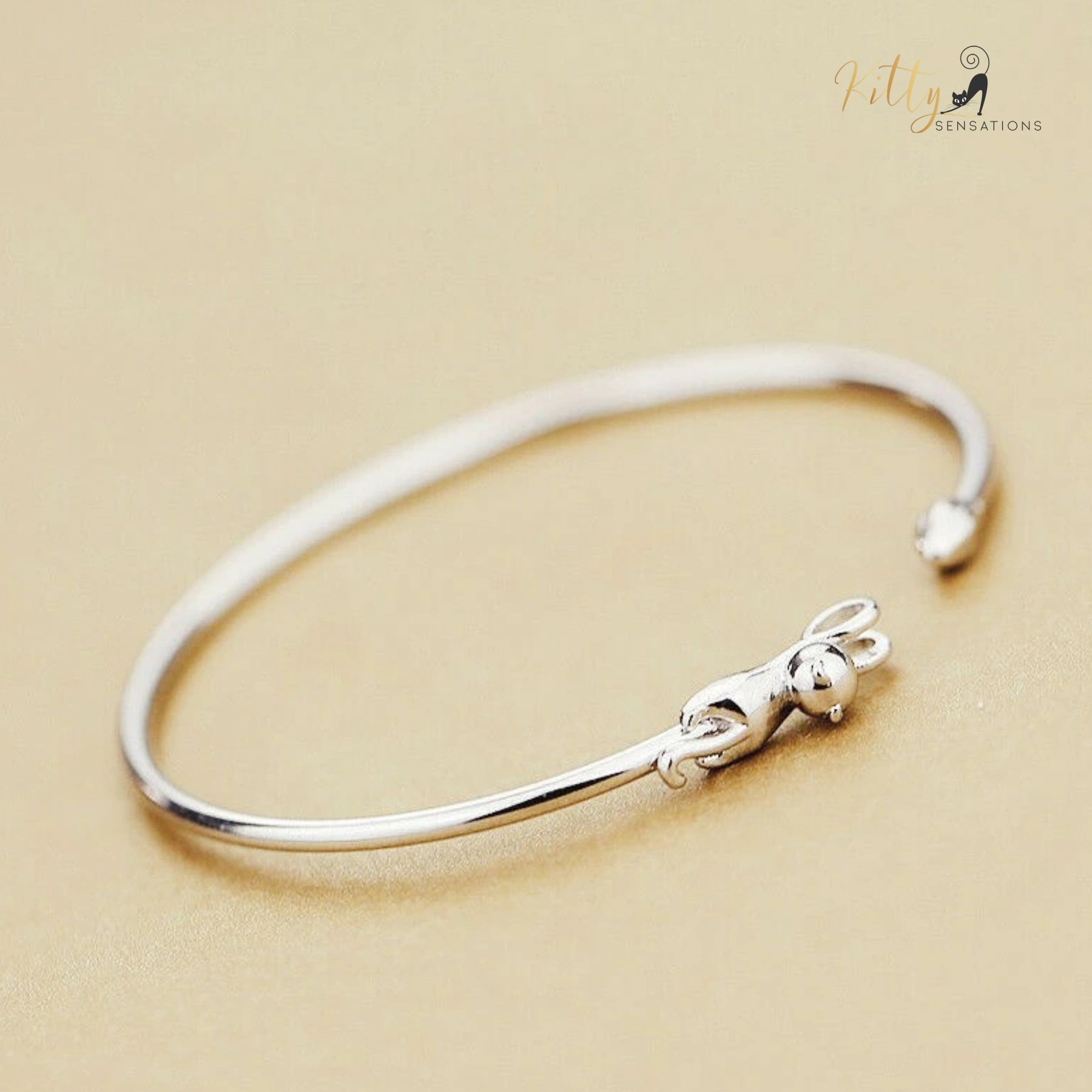 www.KittySensations.com Hanging Cat Cuff Bracelet - Silver Plated (Adjustable) ($12.01): https://www.kittysensations.com/products/hanging-cat-cuff-bracelet-silver-plated-adjustable