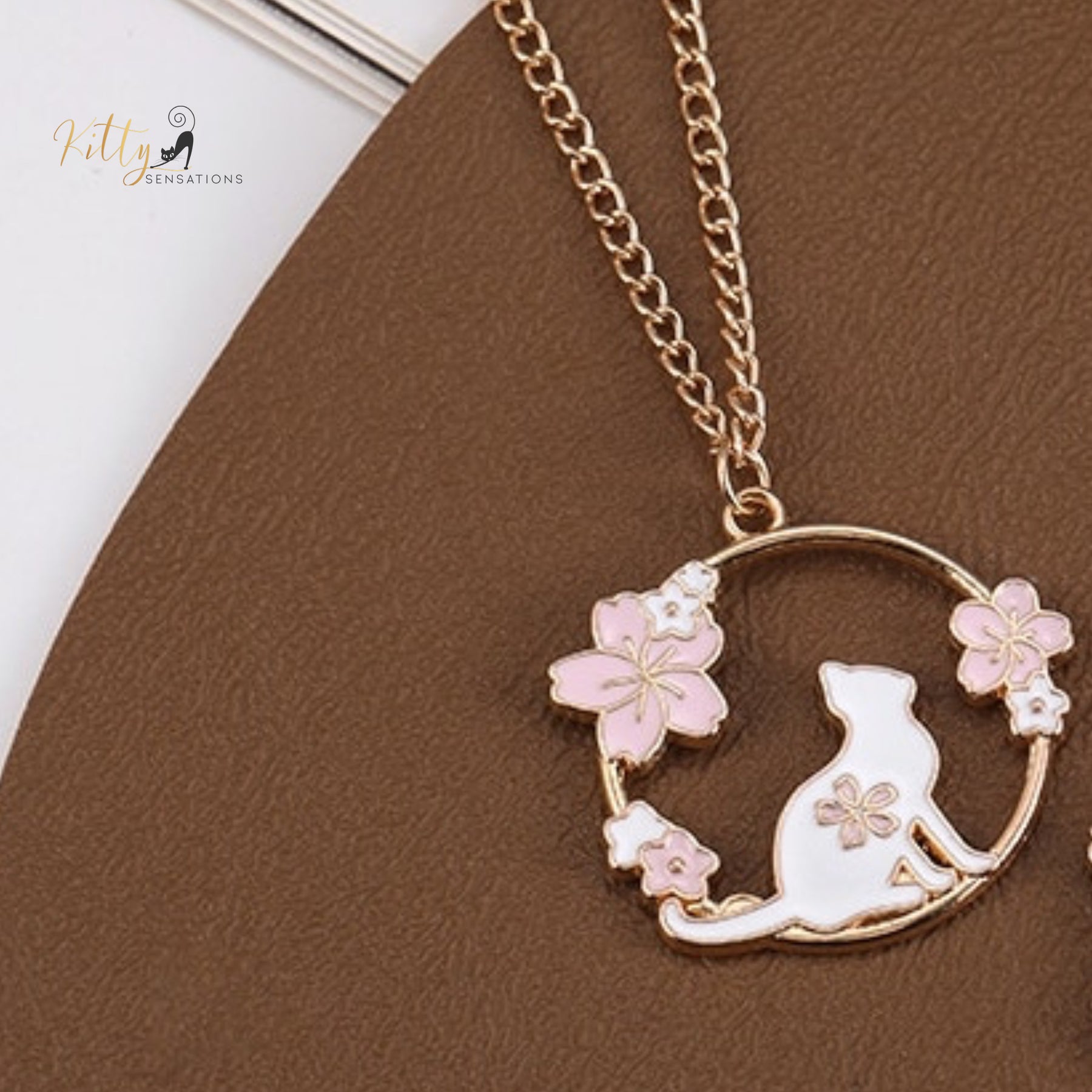 www.KittySensations.com: Jasmines and Orchids Cat Necklace - Enameled - Adjustable Length ($22.30): https://www.kittysensations.com/products/jasmines-and-orchids-cat-pendant-necklace-enameled