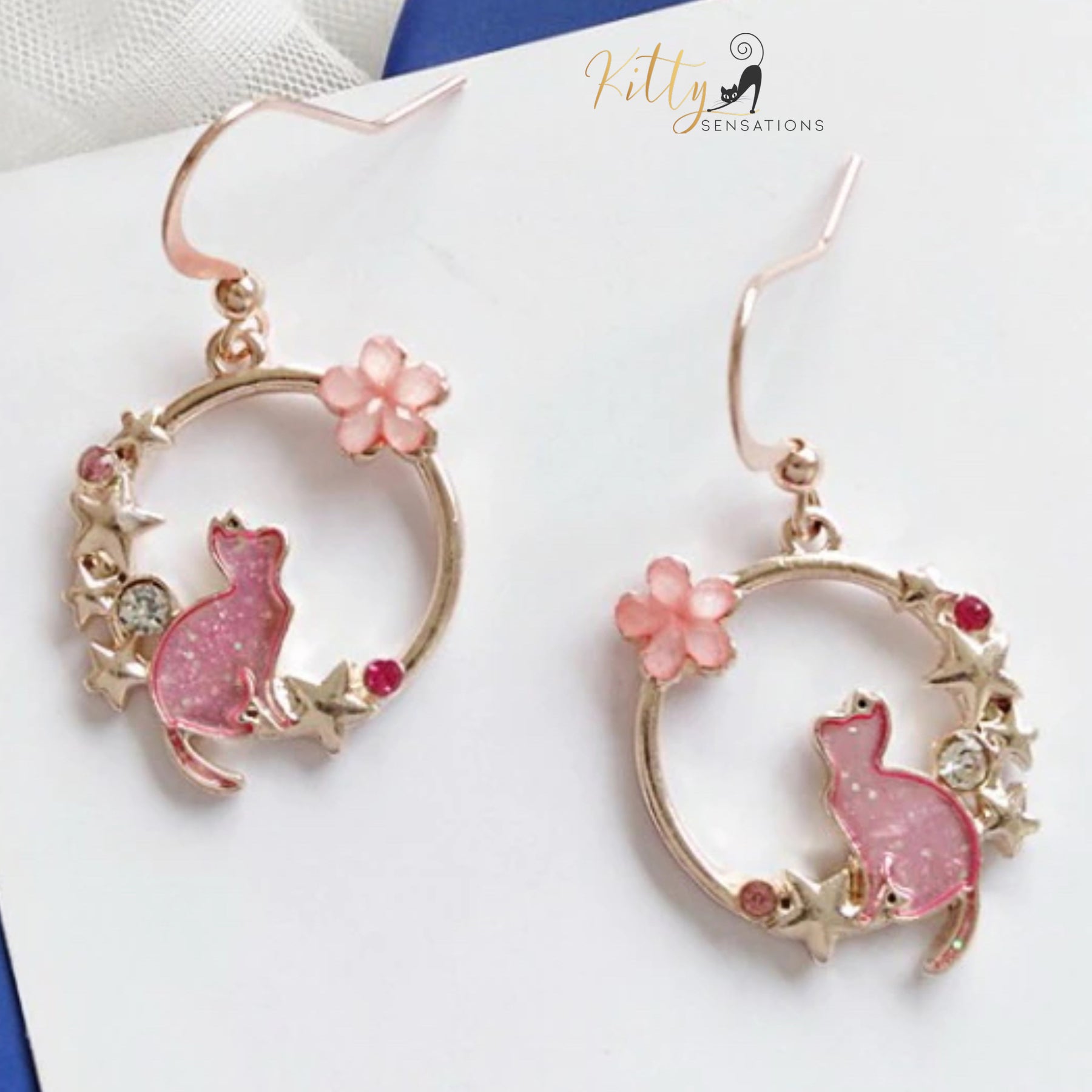 www.KittySensations.com:Jasmine and Stars - Crystal, CZ, and Enamel Kitty Dangle Earrings ($18.08): https://www.kittysensations.com/products/jasmine-and-stars-crystal-cz-and-enameled-kitty-dangle-earrings