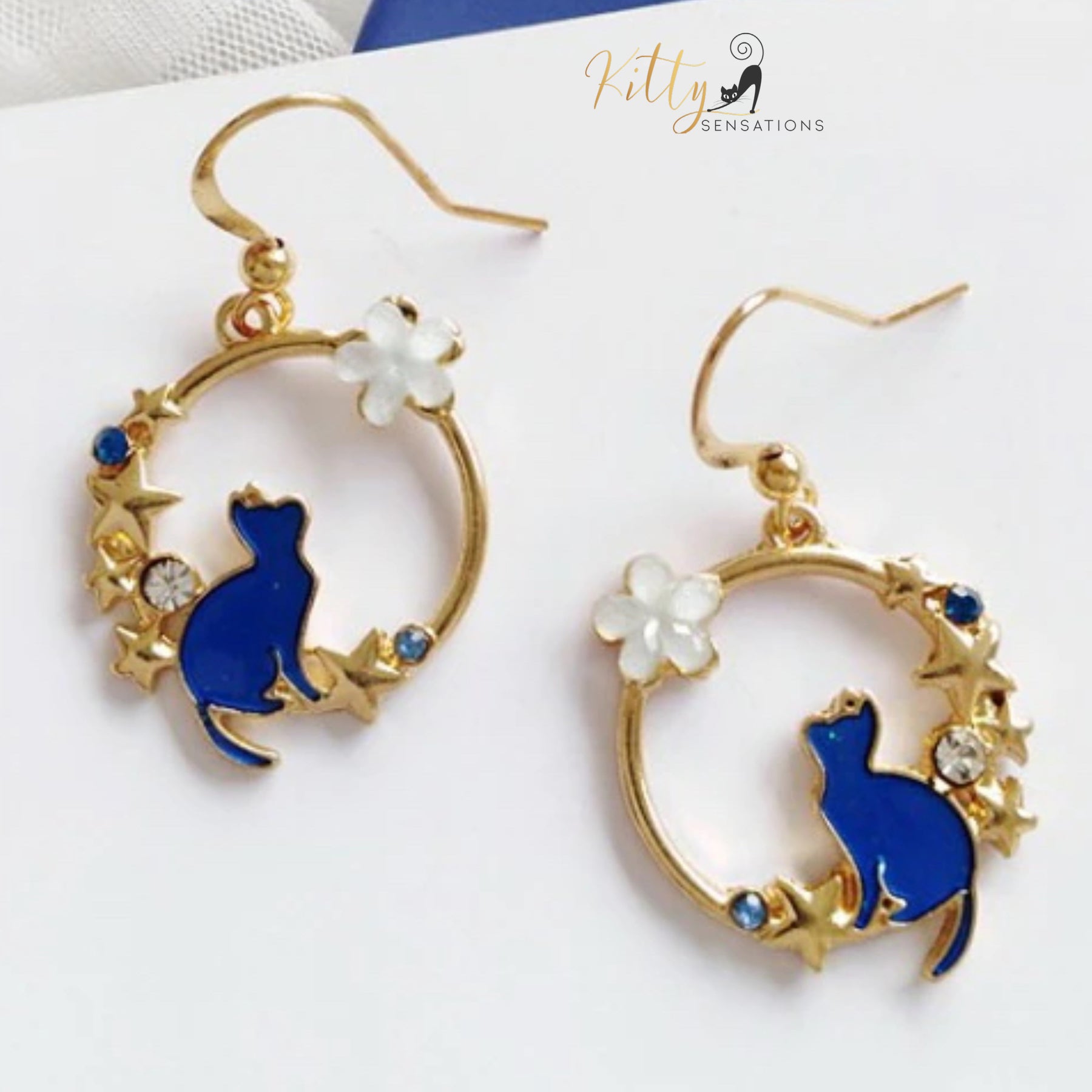 www.KittySensations.com:Jasmine and Stars - Crystal, CZ, and Enamel Kitty Dangle Earrings ($18.08): https://www.kittysensations.com/products/jasmine-and-stars-crystal-cz-and-enameled-kitty-dangle-earrings