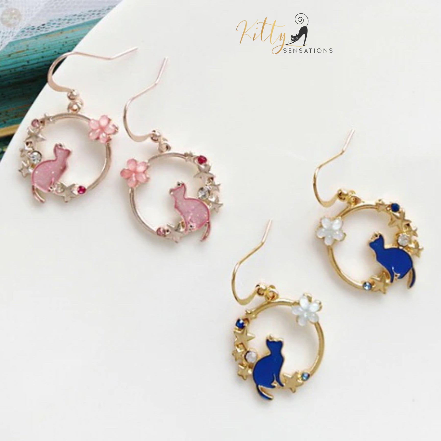 www.KittySensations.com:Jasmine and Stars - Crystal, CZ, and Enamel Kitty Dangle Earrings ($18.08): https://www.kittysensations.com/products/jasmine-and-stars-crystal-cz-and-enameled-kitty-dangle-earrings