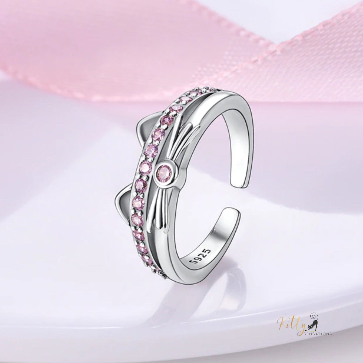 www.KittySensations.com: Kitty Face Ring with Pink Cubic Zirconia in Solid 925 Sterling Silver - Adjustable Size ($25.97): https://www.kittysensations.com/products/kitty-face-ring-with-pink-cubic-zirconia-in-solid-925-sterling-silver