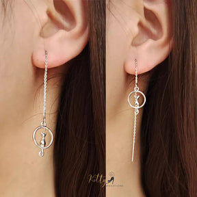 Adjustable Length Moon Kitty Tassel Earrings (White Gold Plated) ($31.13): https://www.kittysensations.com/products/moon-kitty-tassel-earrings-white-gold-plated?_pos=1&_psq=tassel&_ss=e&_v=1.0