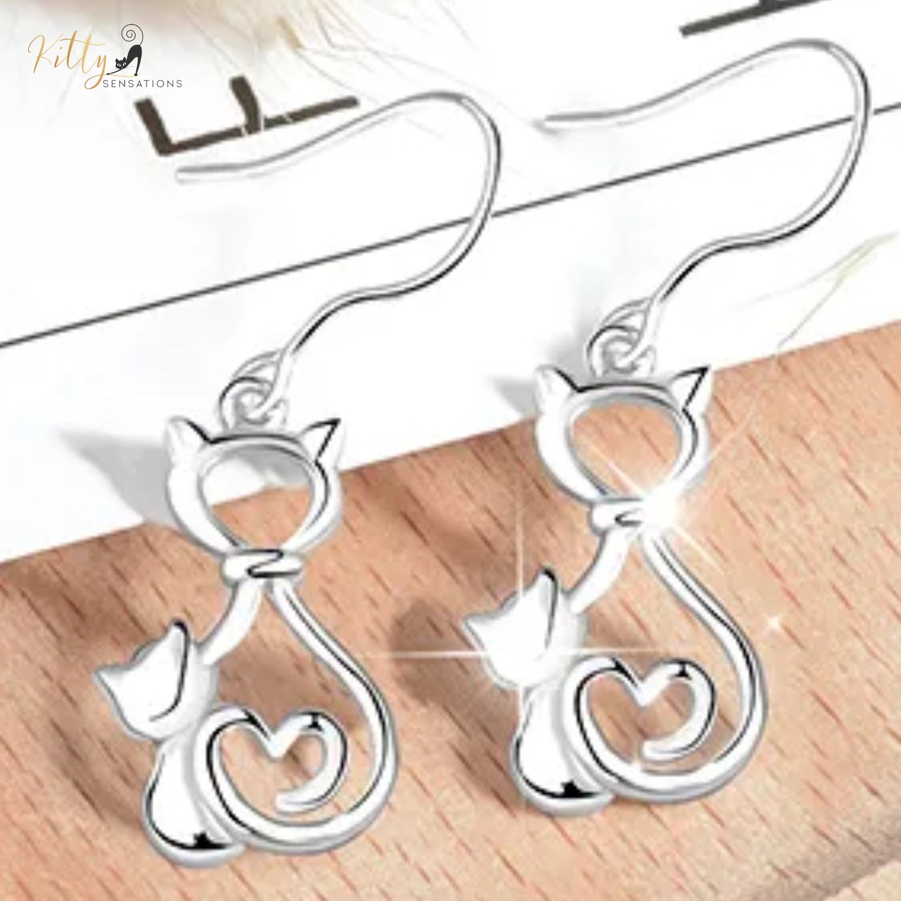 www.KittySensations.com: Mother and Child Cat Earrings in Solid 925 Sterling Silver (Rhodium Plated) ($79.85): https://www.kittysensations.com/products/mother-and-child-cat-earrings-in-solid-925-sterling-silver-rhodium-plated