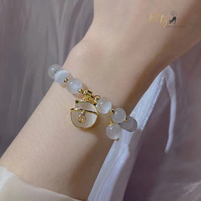 www.KittySensations.com Natural Opal with Golden Beads and Kitty Face Charm Bracelet ($24.40): https://www.kittysensations.com/products/natural-opal-cat-bracelet