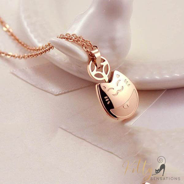 rose gold plated cat necklace on white table kittysensations 25402914-rose-gold