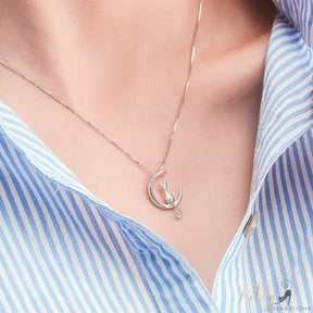 cat moon necklace in sterling silver worn by woman 7604327-silver