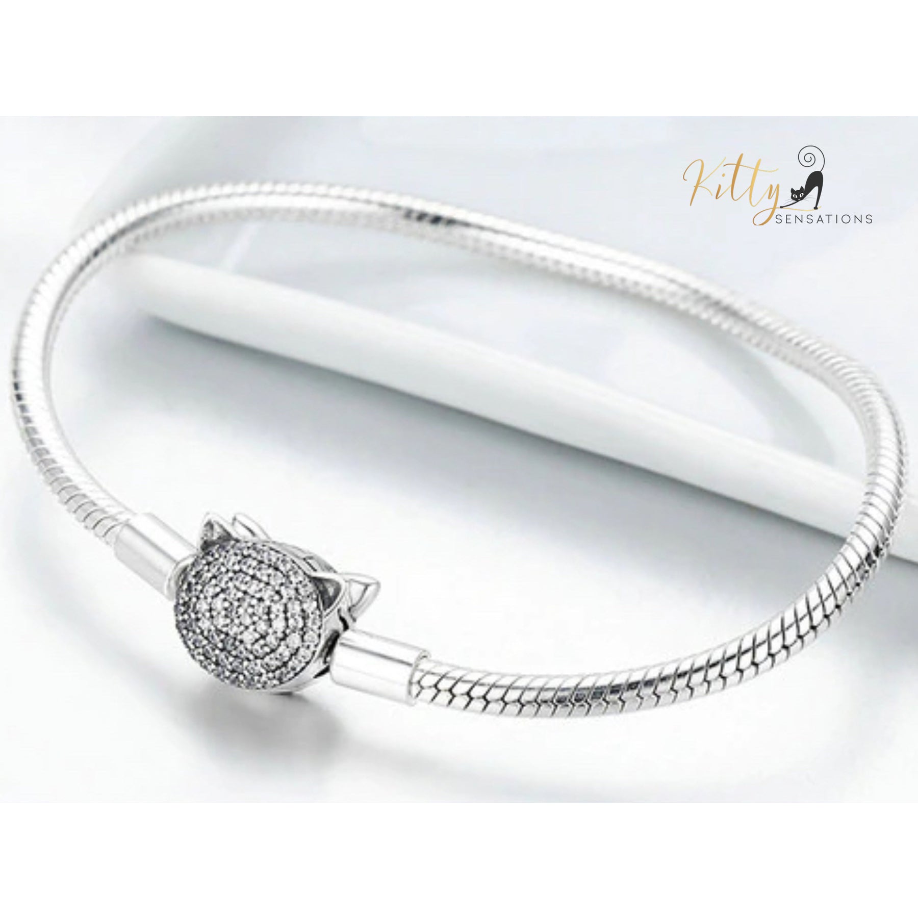 www.KittySensations.com: Pave Cubic Zirconia Kitty Face Bracelet (Fine Jewelry) - Solid 925 Sterling Silver, Platinum Plated: https://www.kittysensations.com/products/pave-cubic-zirconia-kitty-face-bracelet-fine-jewelry-solid-925-sterling-silver-platinum-plated